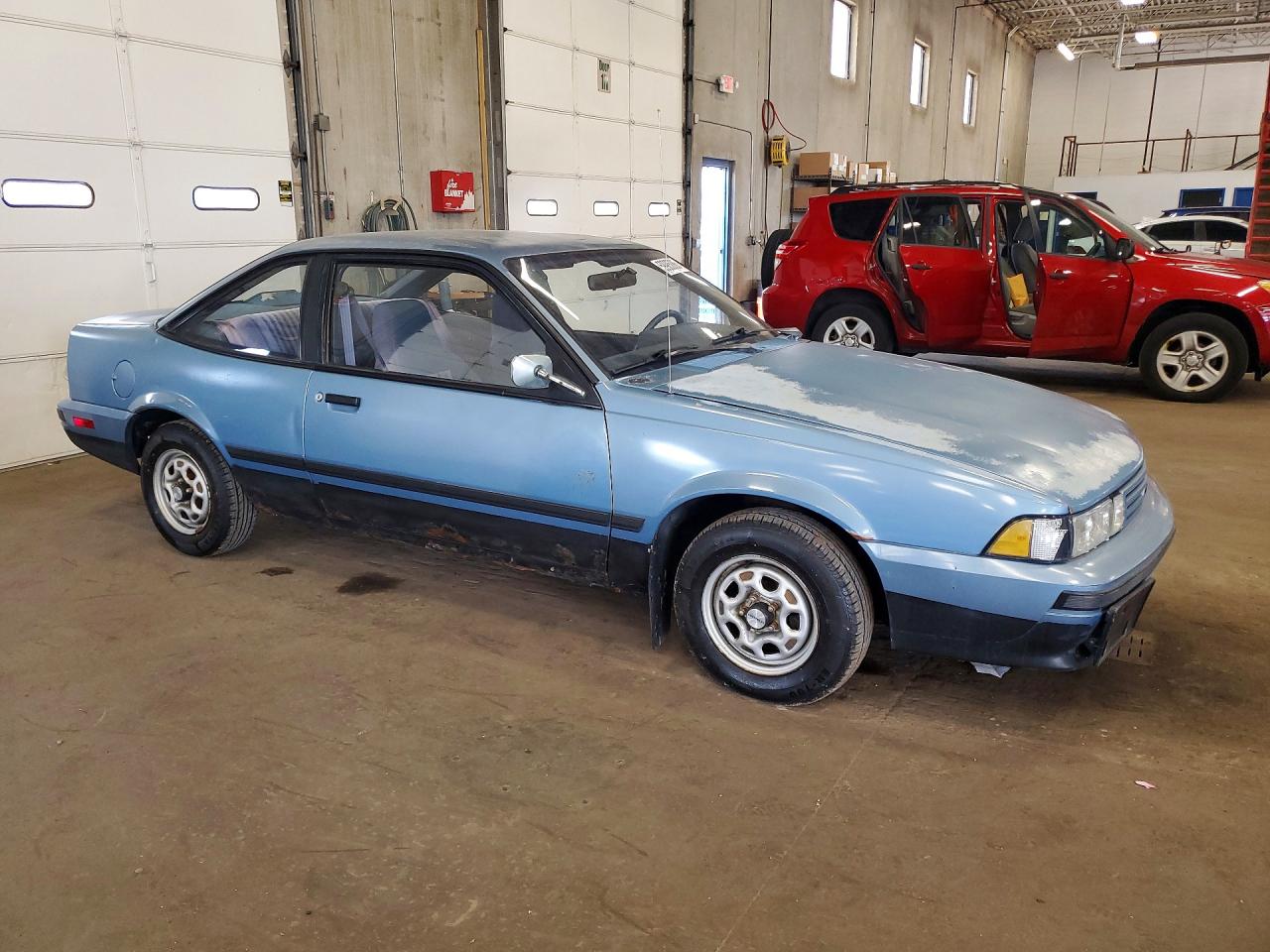 1990 Chevrolet Cavalier Base Blue vin: 1G1JC14G9LJ188632