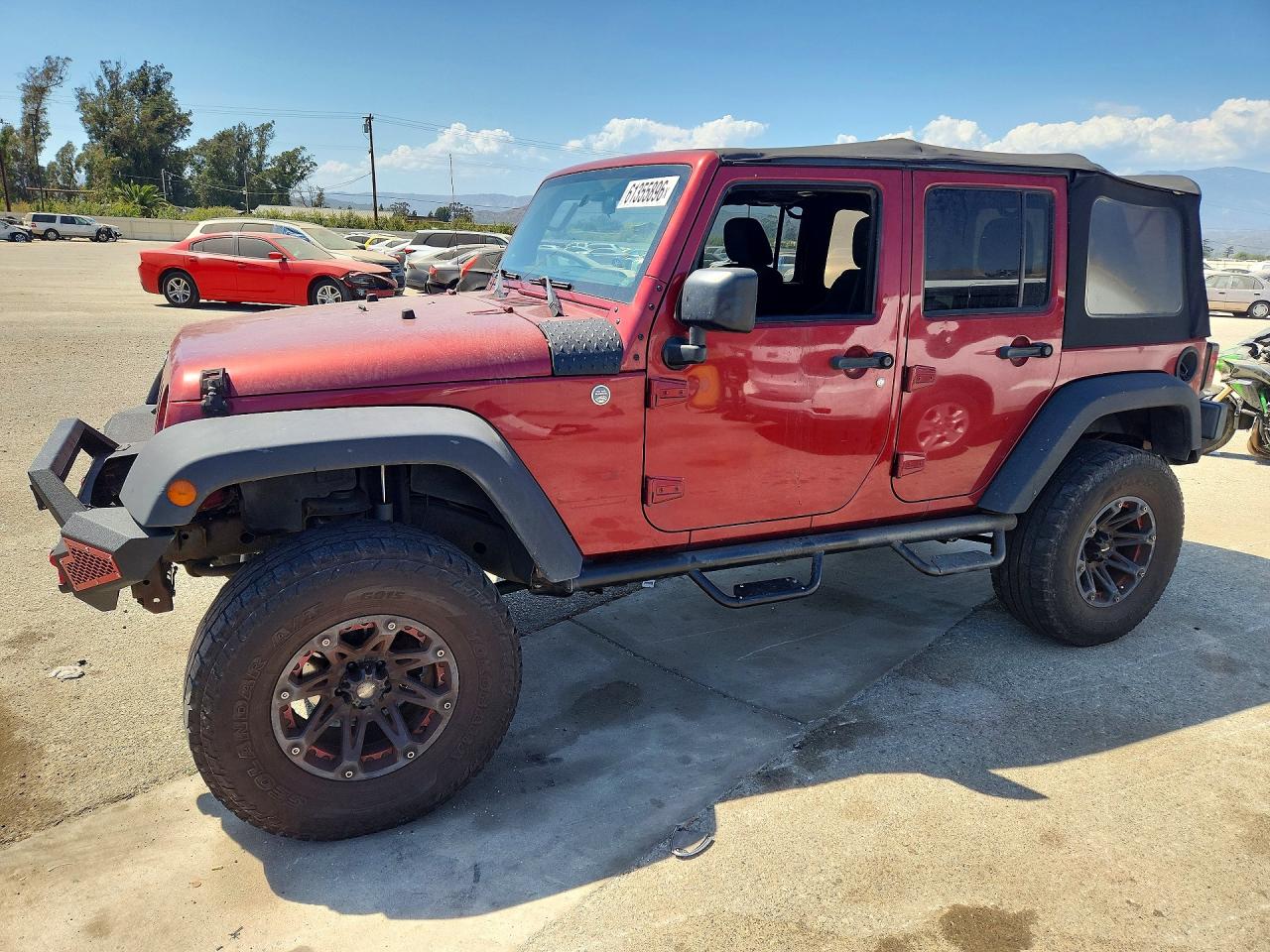 2012 Jeep Wrangler Unlimited Sport Burgundy vin: 1C4BJWDGXCL201195