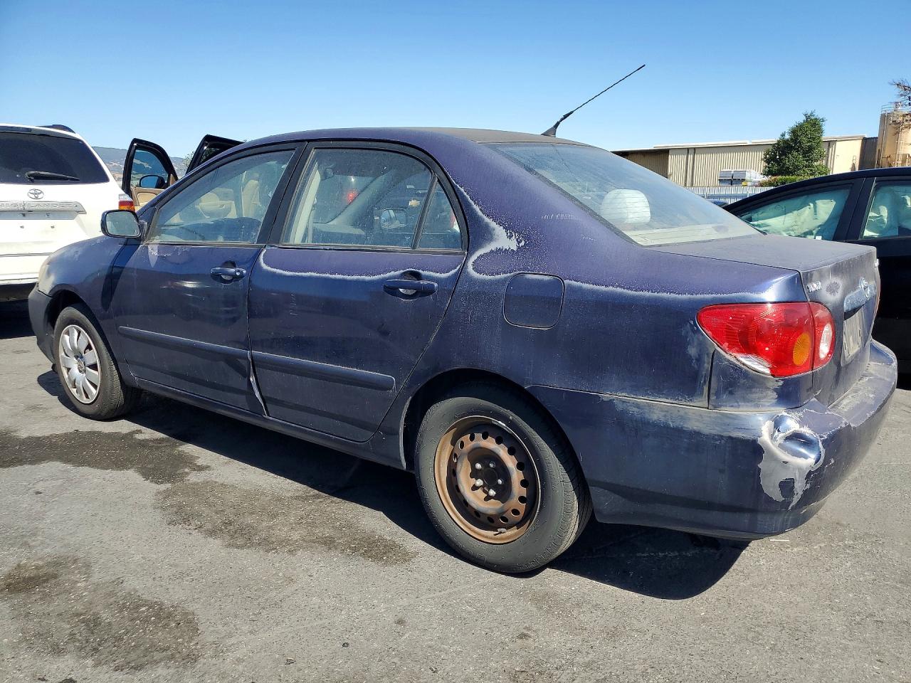 2004 Toyota Corolla Le Blue vin: 1NXBR32E84Z260617