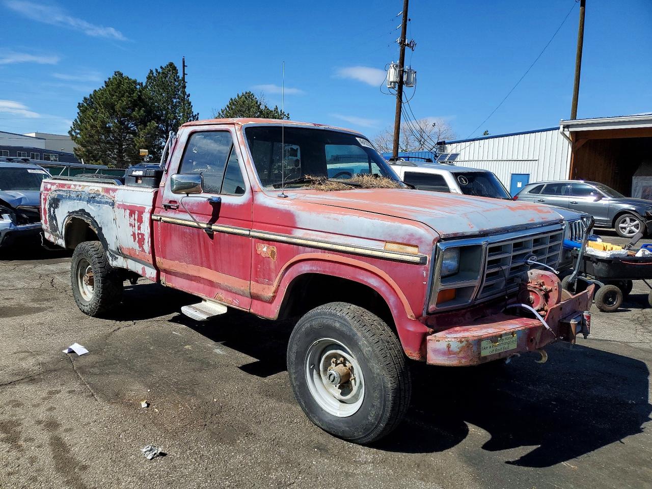 1985 Ford F250 Red vin: 1FTHF2614FPB38556