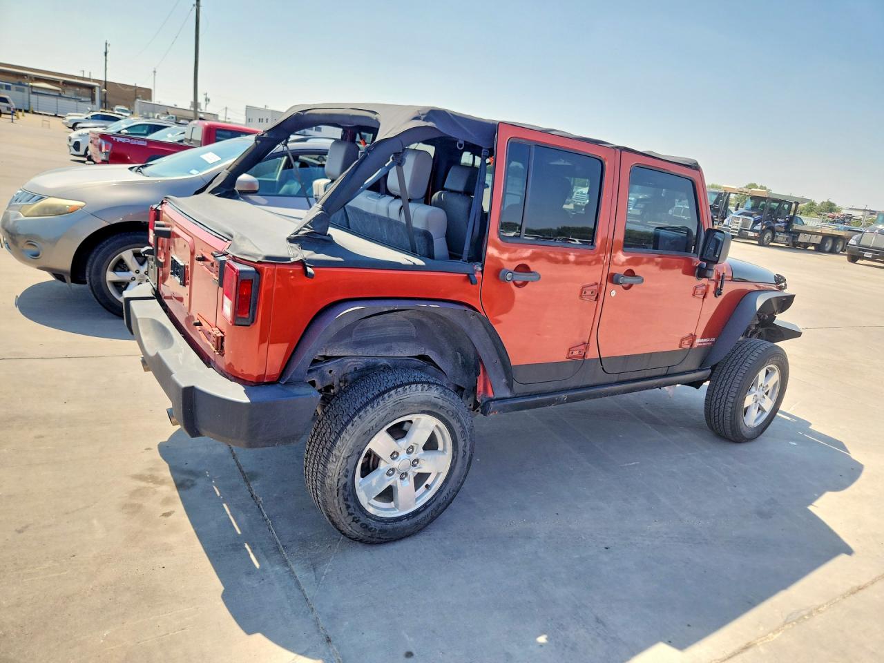 2009 Jeep Wrangler Unlimited Rubicon Red vin: 1J4GA69199L769399