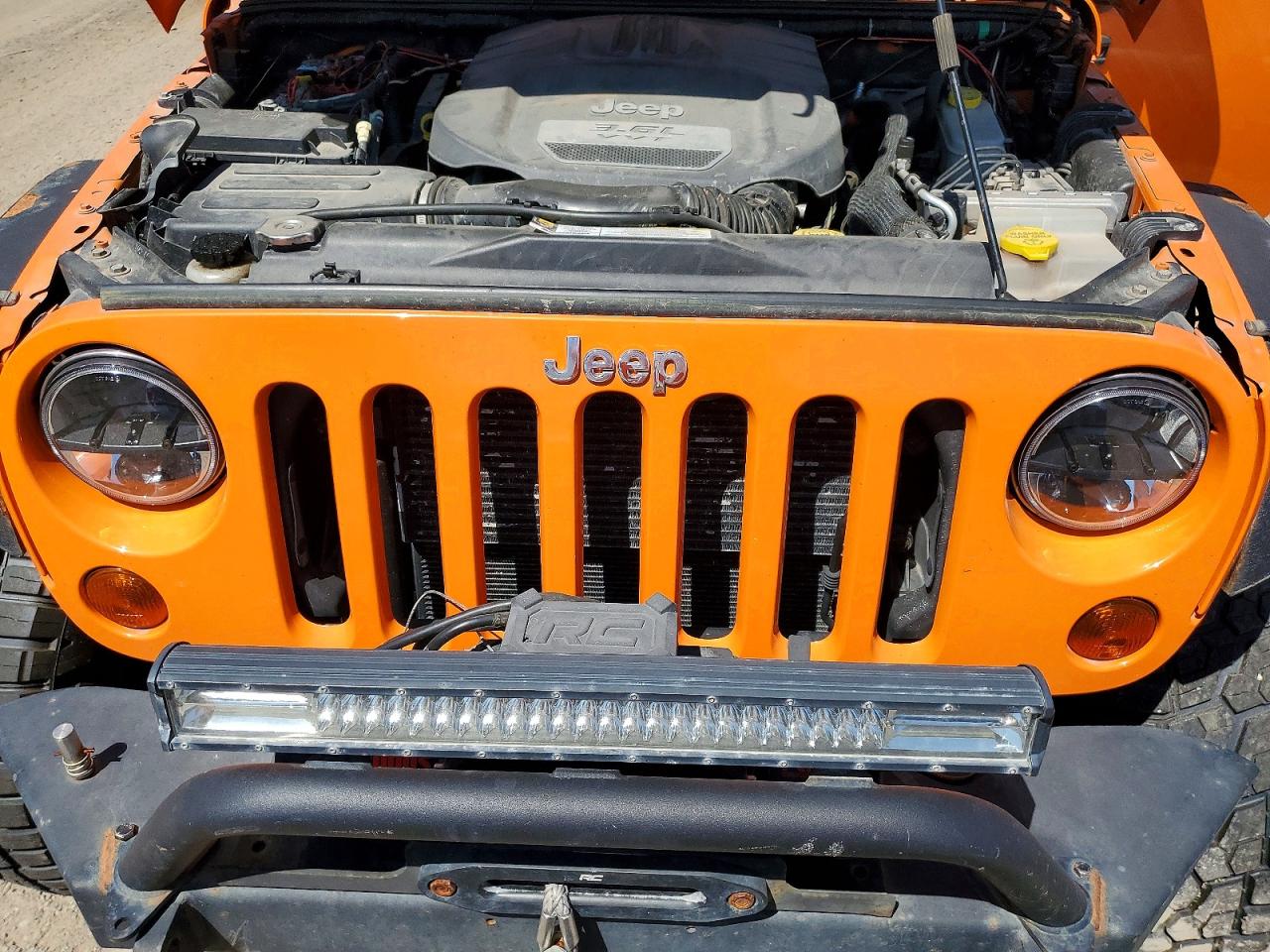 2012 Jeep Wrangler Unlimited Rubicon Orange vin: 1C4HJWFG9CL151879