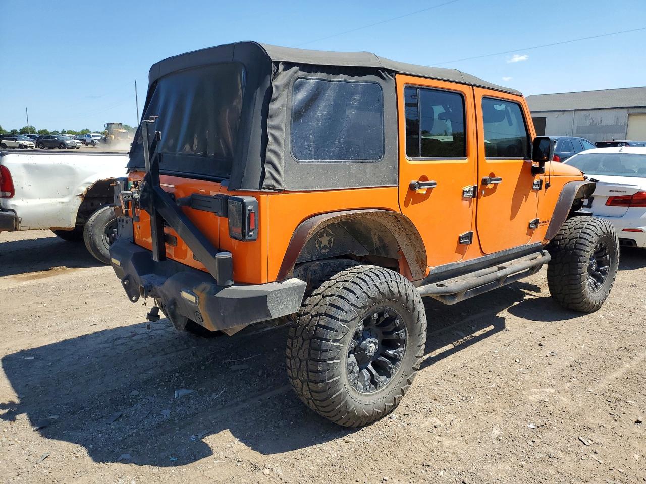 2012 Jeep Wrangler Unlimited Rubicon Orange vin: 1C4HJWFG9CL151879