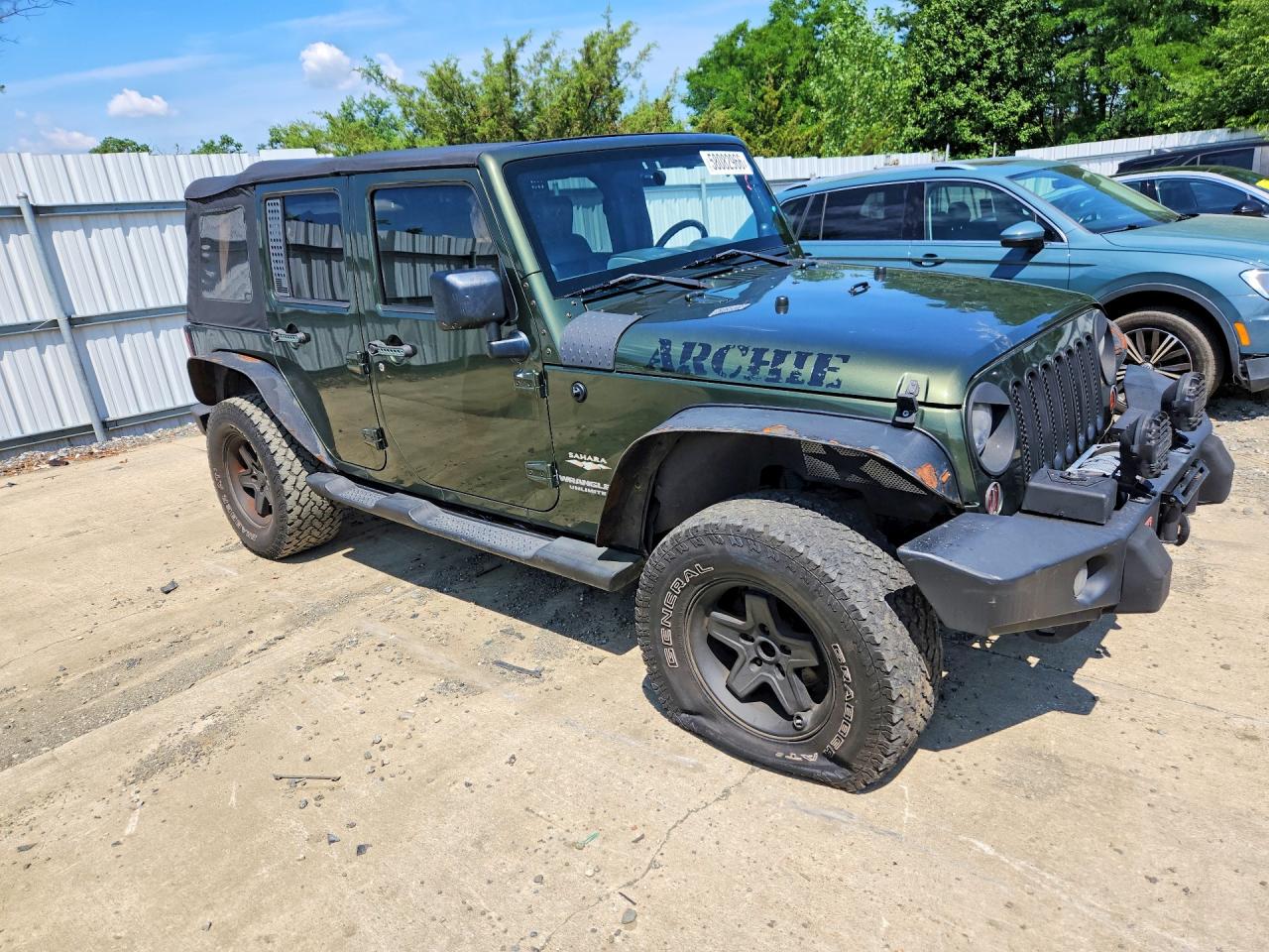 2009 Jeep Wrangler Unlimited Sahara Green vin: 1J4GA59199L733965