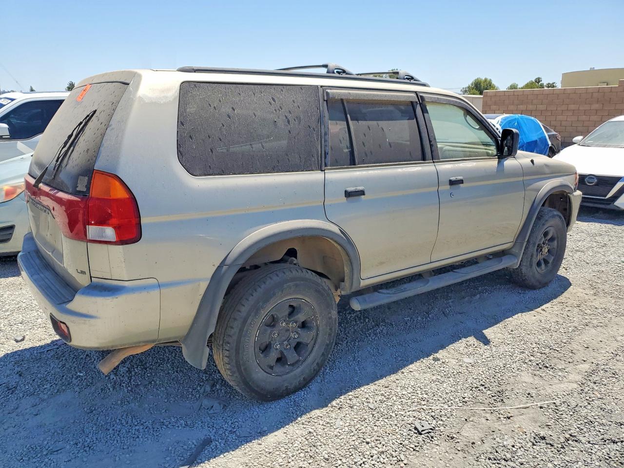 1999 Mitsubishi Montero Sport Ls Tan vin: JA4LS31H3XP043207