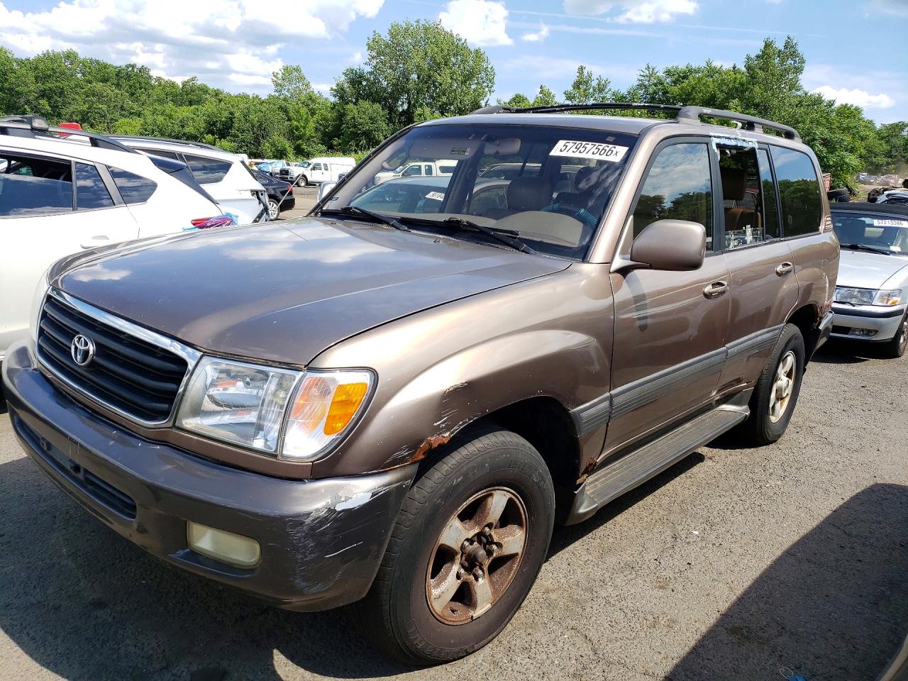 2000 Toyota Land Cruiser Base Gold vin: JT3HT05J9Y0097047