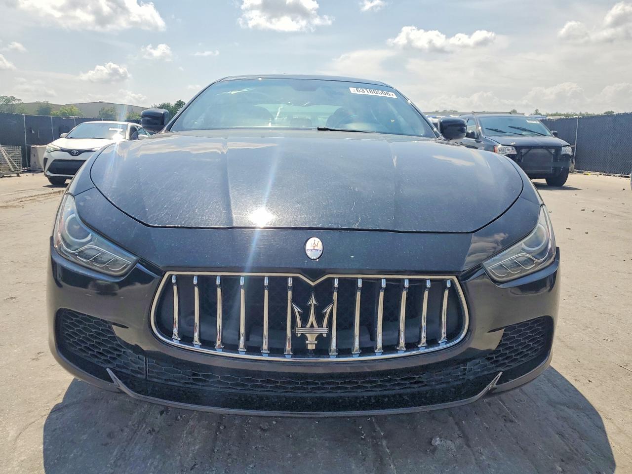 2014 Maserati Ghibli S Black vin: ZAM57RTAXE1090359