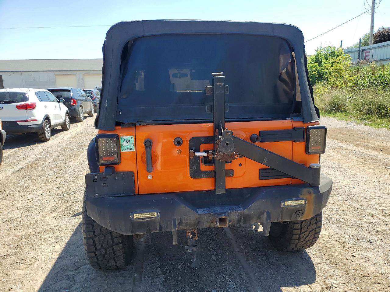 2012 Jeep Wrangler Unlimited Rubicon Orange vin: 1C4HJWFG9CL151879