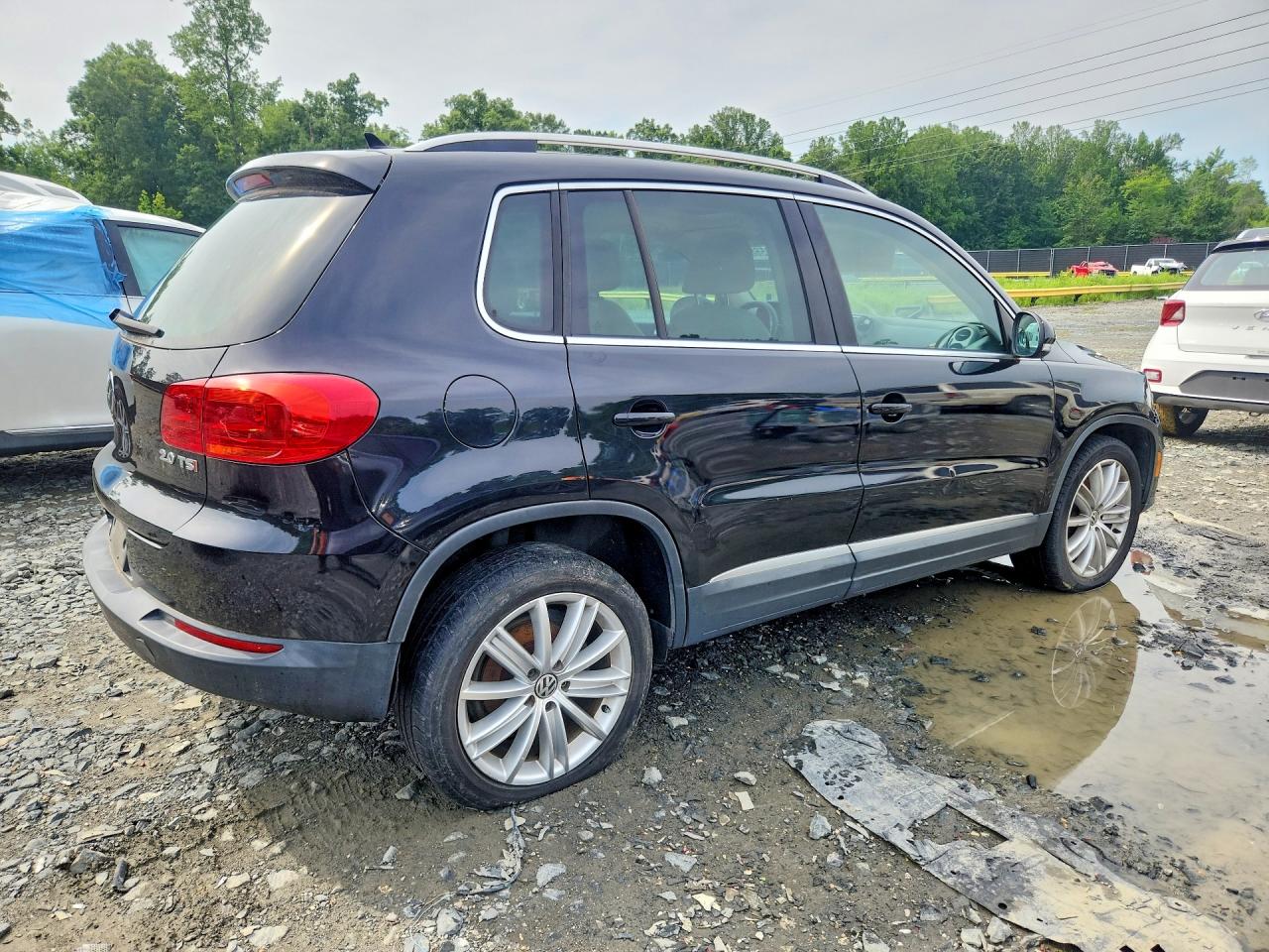 2014 Volkswagen Tiguan S Black vin: WVGAV3AXXEW608871