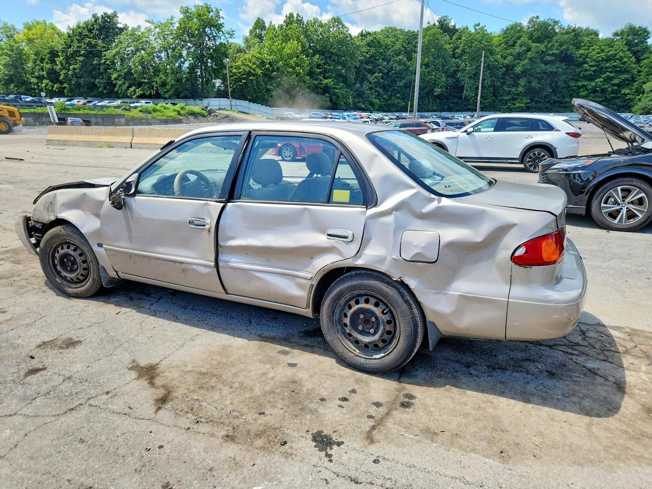 2002 Toyota Corolla Le Бежевый vin: 2T1BR12E82C548835