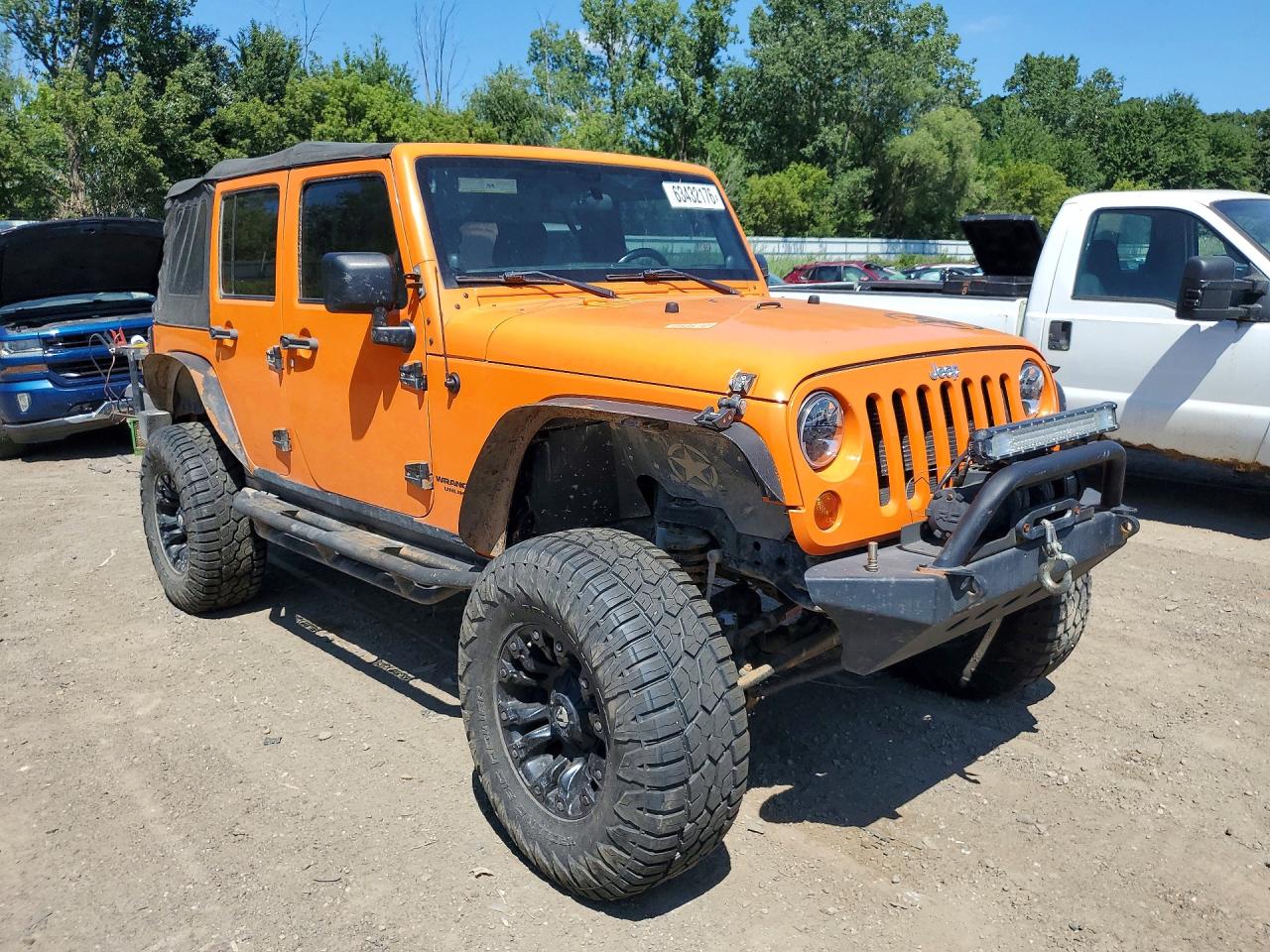 2012 Jeep Wrangler Unlimited Rubicon Orange vin: 1C4HJWFG9CL151879