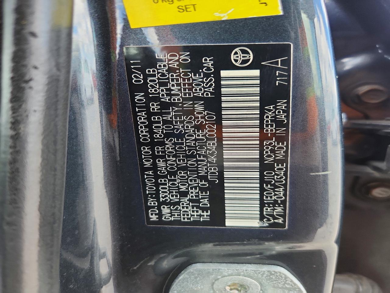 2011 Toyota Yaris Base Black vin: JTDBT4K34BL002107