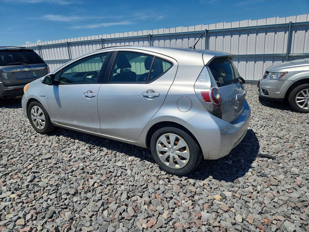 2012 Toyota Prius C Two Серебряный vin: JTDKDTB3XC1511168