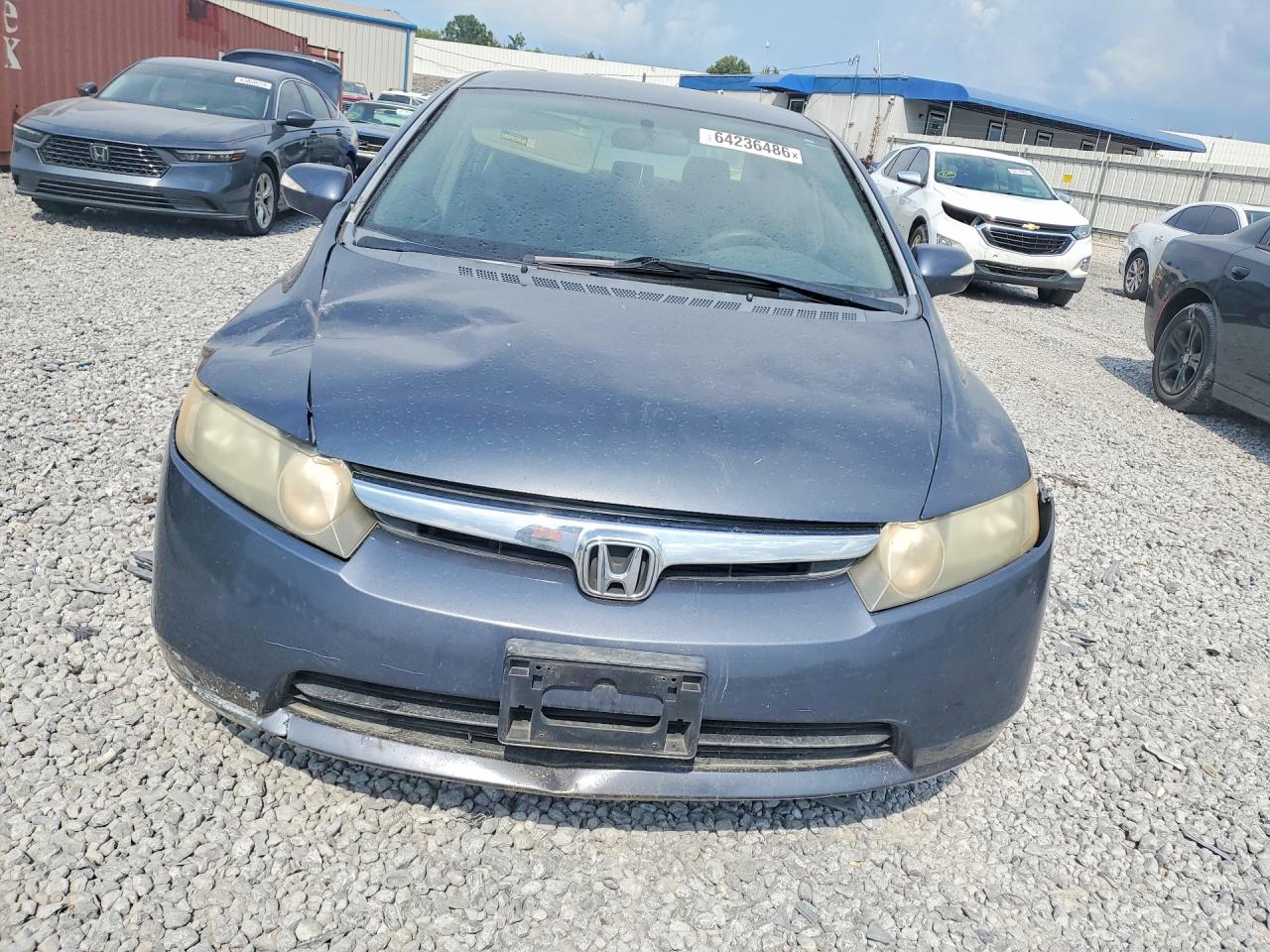 2006 Honda Civic Hybrid Blue vin: JHMFA36236S028386
