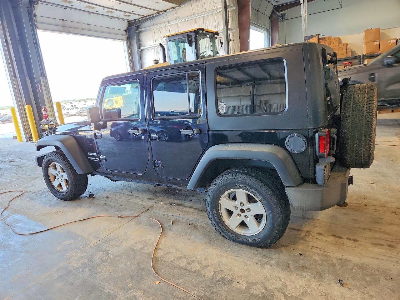 2010 Jeep Wrangler Unlimited Sport Черный vin: 1J4BA3H11AL145806
