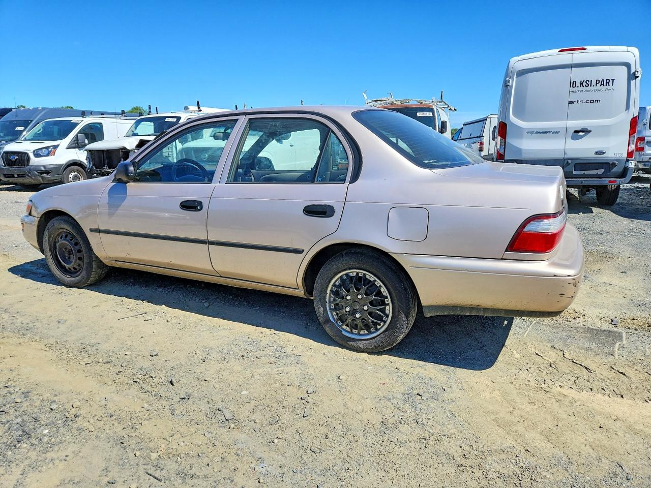 1997 Toyota Corolla Base Gold vin: 2T1BA02EXVC176906