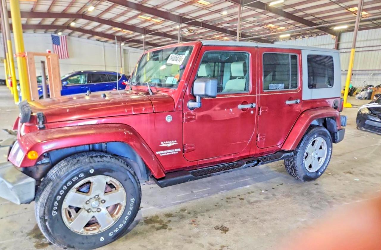 2009 Jeep Wrangler Unlimited Sahara Red vin: 1J4GA59169L750562