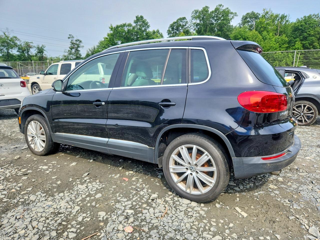 2014 Volkswagen Tiguan S Black vin: WVGAV3AXXEW608871