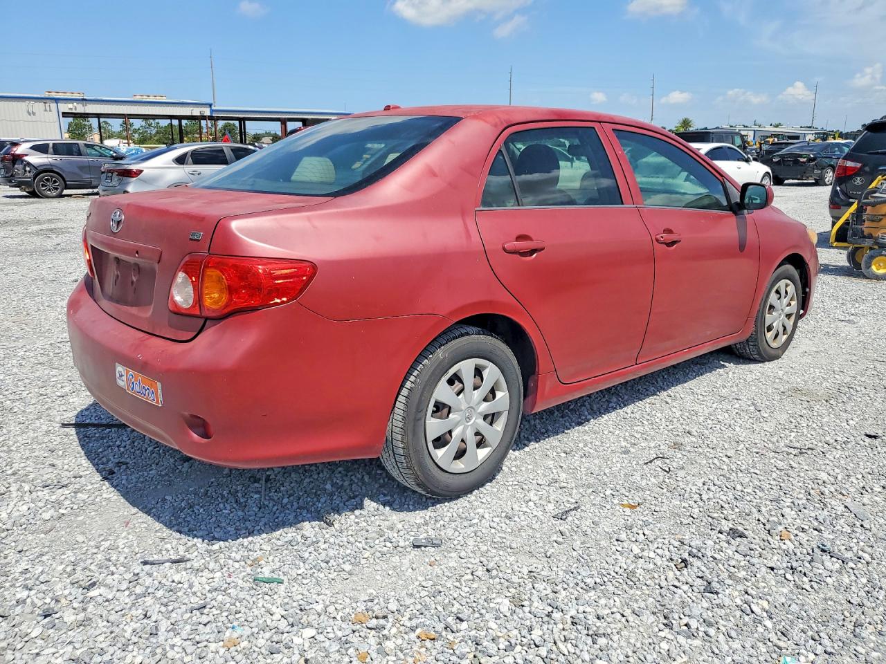 2009 Toyota Corolla Le Red vin: JTDBL40E499034910