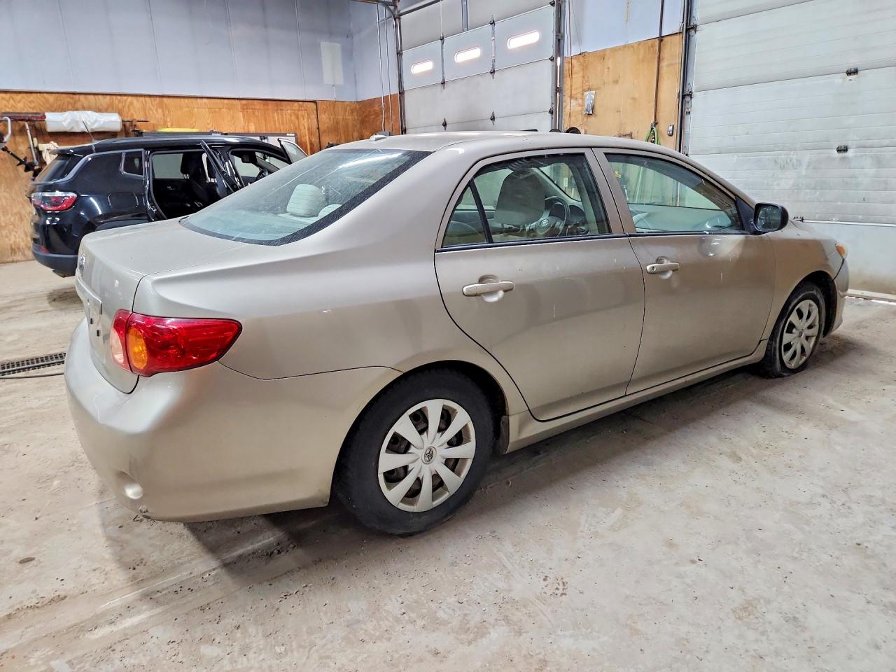 2009 Toyota Corolla Base Gold vin: 2T1BU40EX9C006004