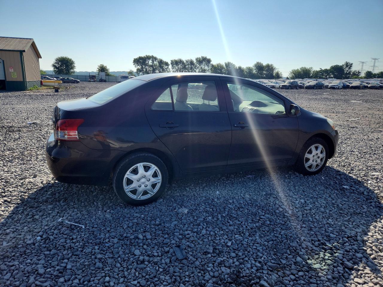2010 Toyota Yaris Base Black vin: JTDBT4K37A1376091