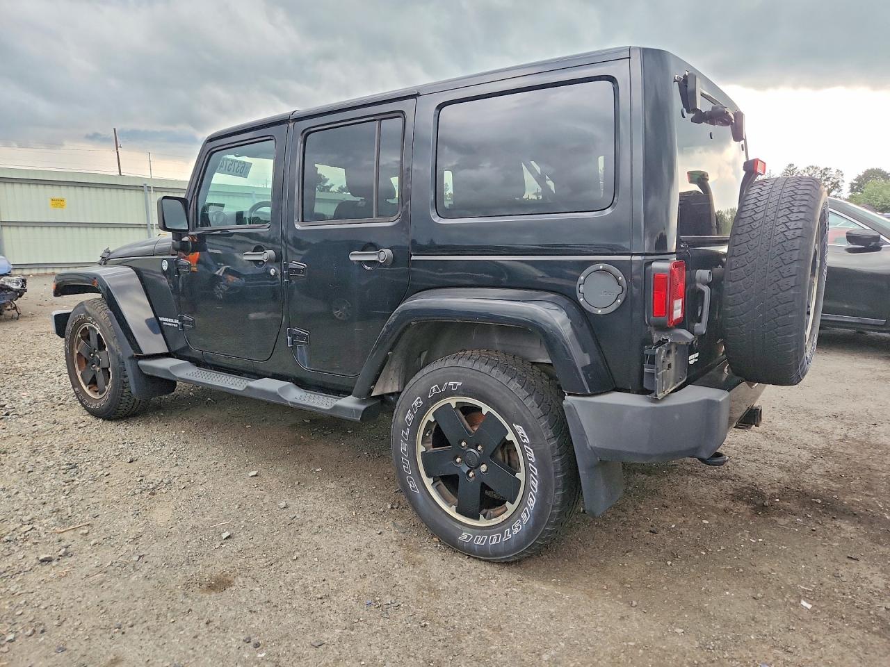 2012 Jeep Wrangler Unlimited Sahara Черный vin: 1C4BJWEG2CL254794