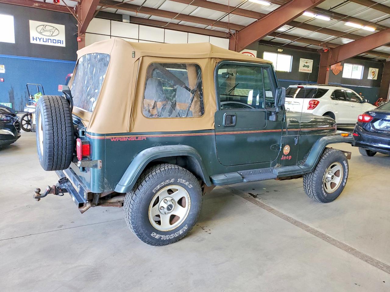 1994 Jeep Wrangler / Yj Sahara Green vin: 1J4FY49S8RP424247