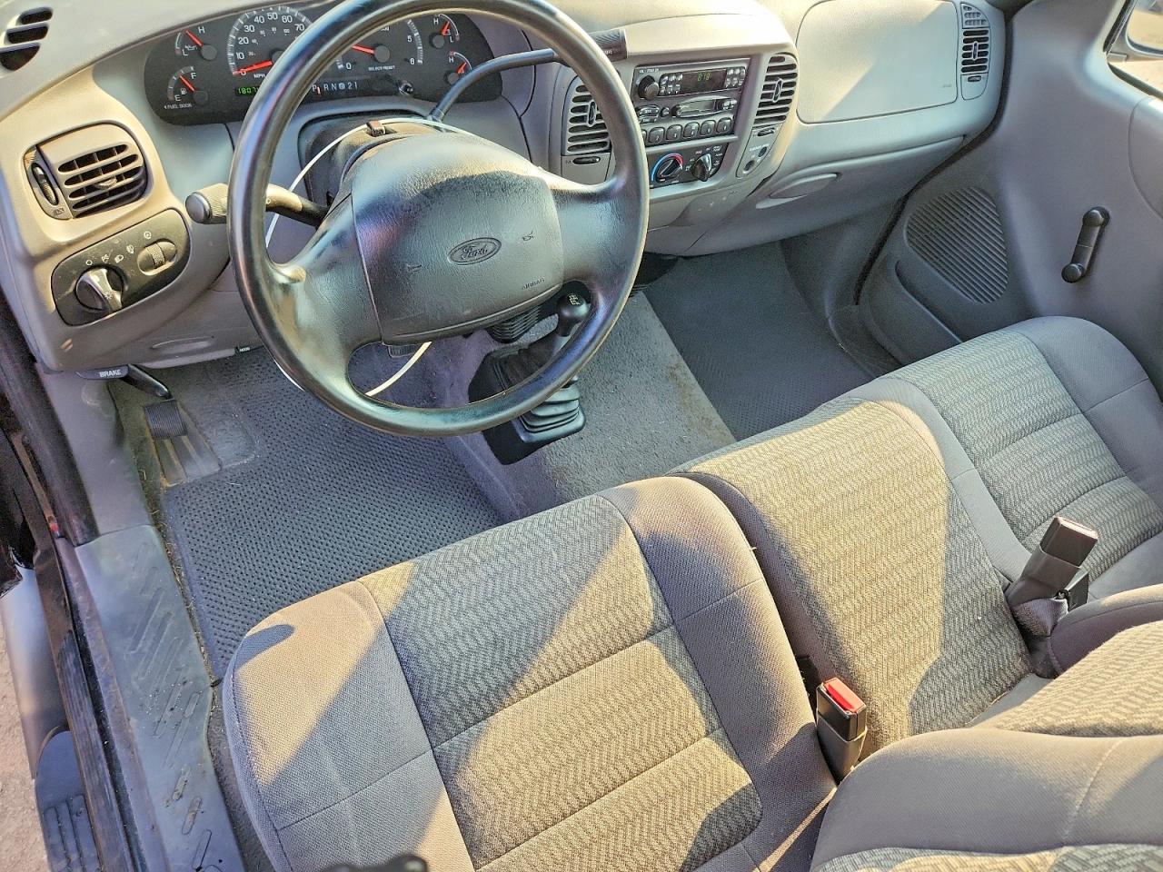 2002 Ford F150 Black vin: 1FTRF182X2NA47575