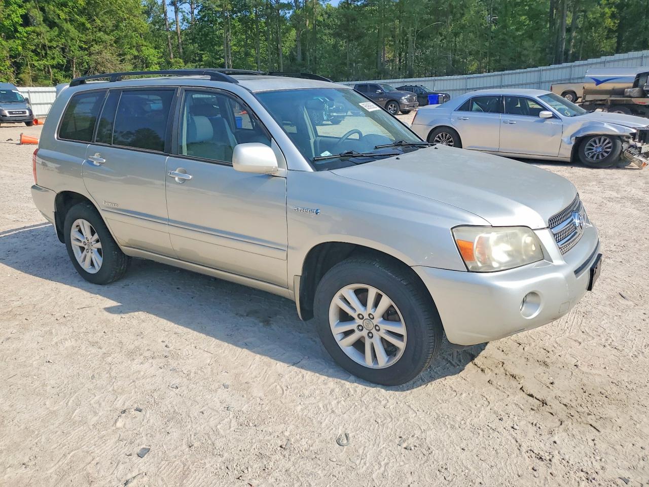 2006 Toyota Highlander Hybrid Gold vin: JTEEW21A860021738