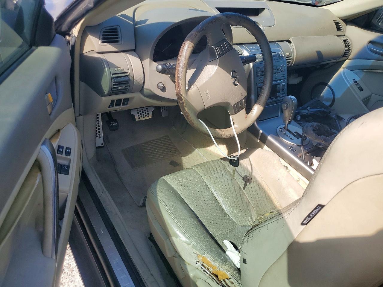 2004 Infiniti G35 Blue vin: JNKCV54E14M309037