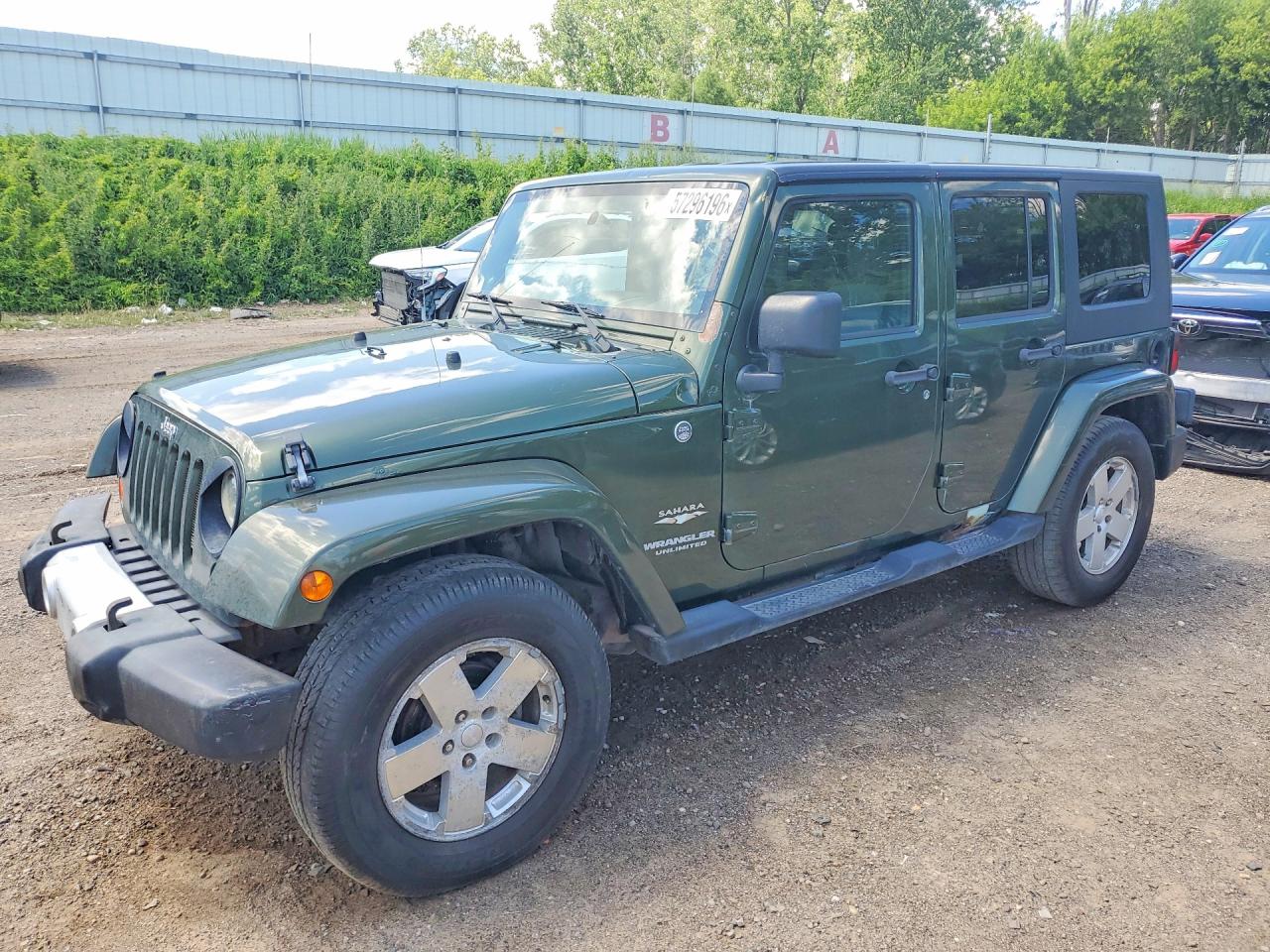 2009 Jeep Wrangler Unlimited Sahara Green vin: 1J4GA59159L733168