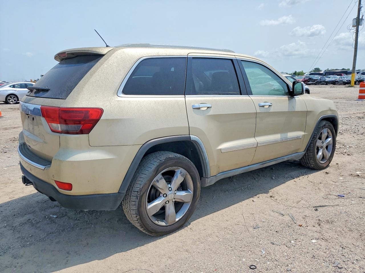 2011 Jeep Grand Cherokee Overland Gold vin: 1J4RR6GT7BC713036