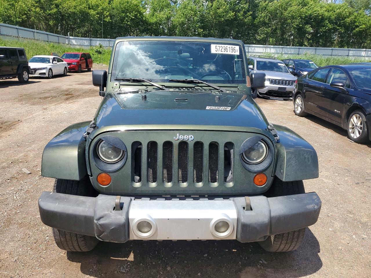 2009 Jeep Wrangler Unlimited Sahara Green vin: 1J4GA59159L733168