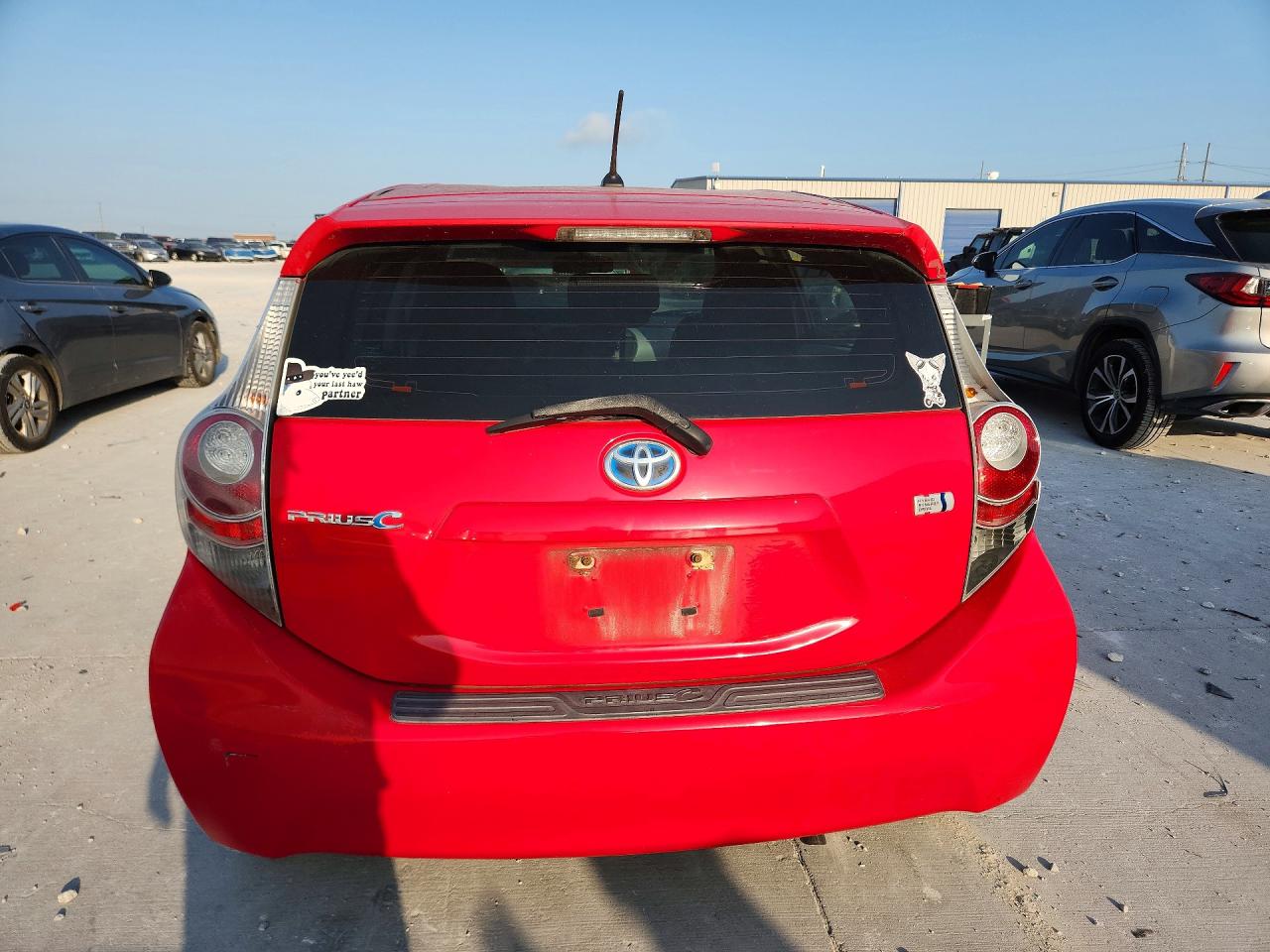 2012 Toyota Prius C Two Red vin: JTDKDTB31C1503220