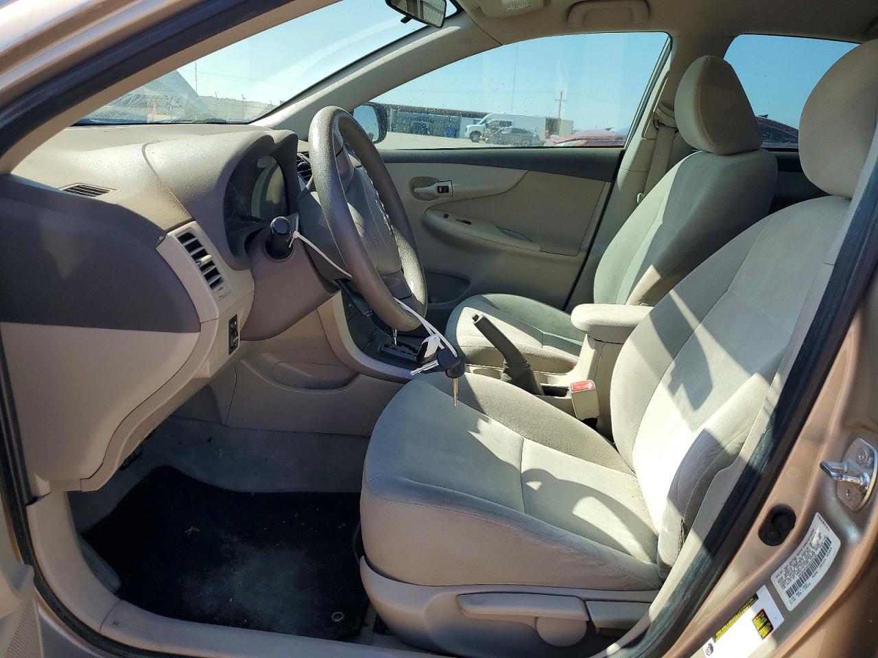 2009 Toyota Corolla Le Tan vin: 1NXBU40E69Z158148
