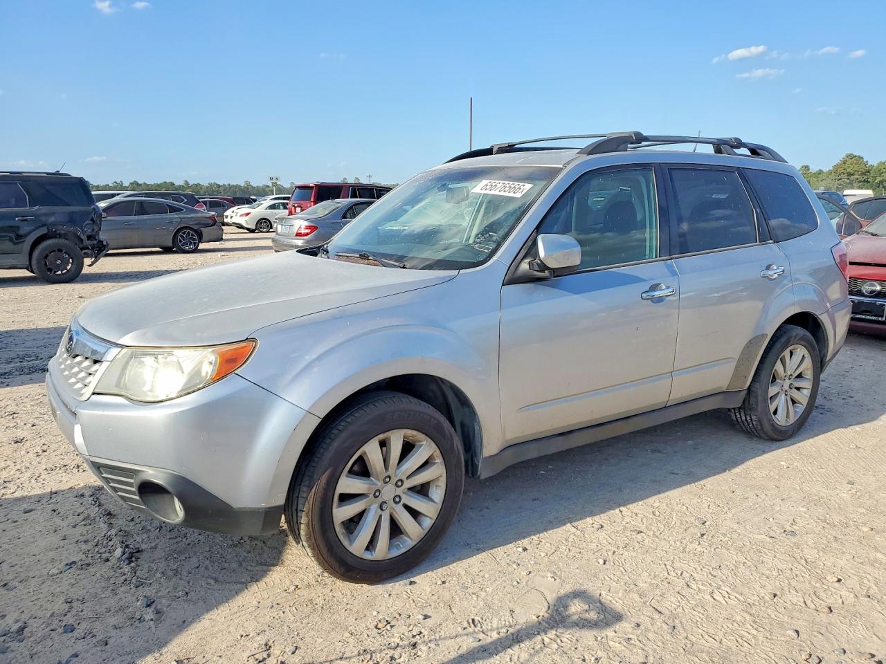 2012 Subaru Forester Limited Серебряный vin: JF2SHBEC7CH412911
