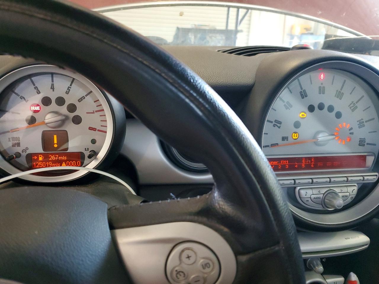 2009 Mini Cooper Maroon vin: WMWMF33519TU70314