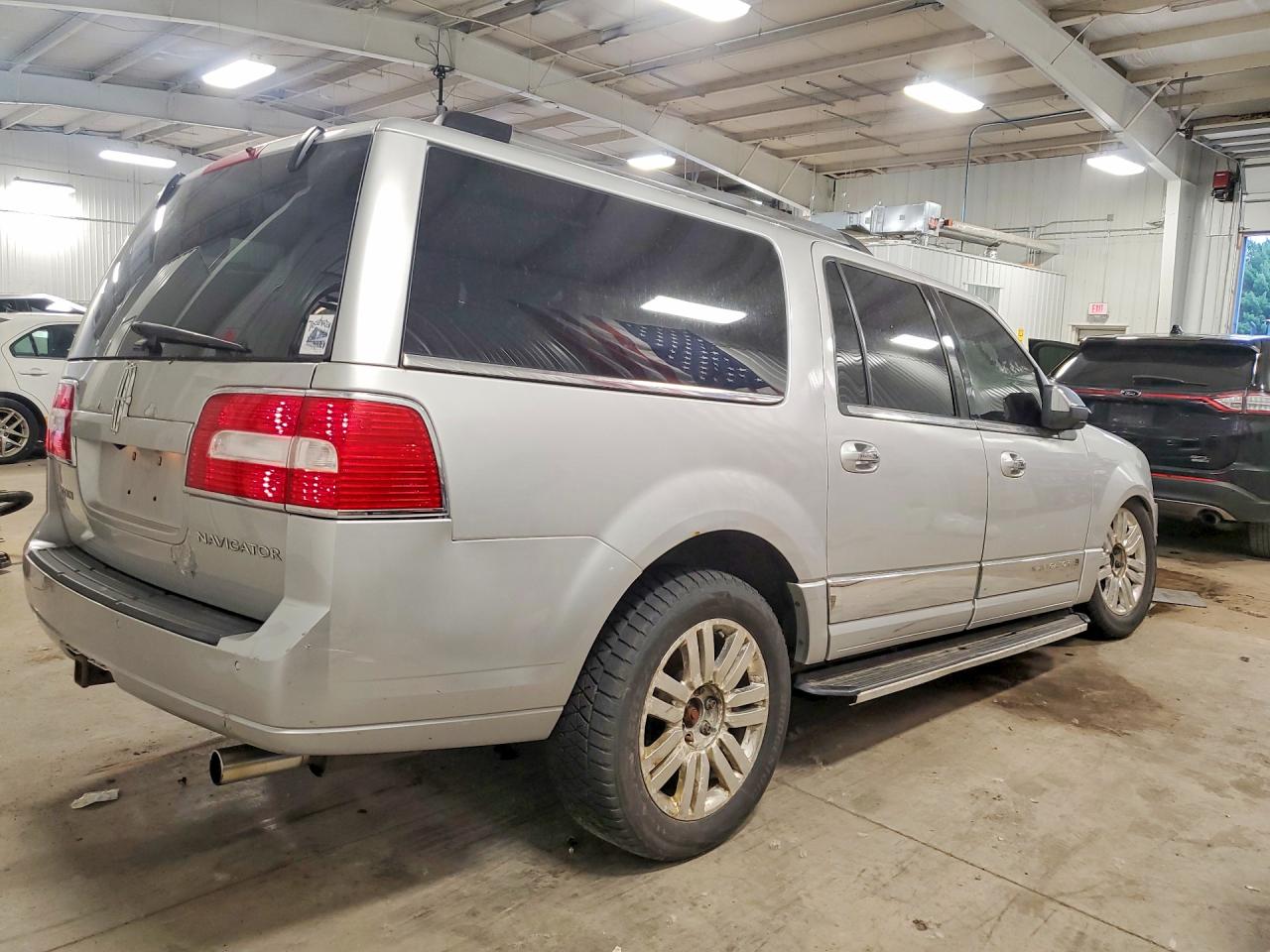 2012 Lincoln Navigator L Серебряный vin: 5LMJJ3J55CEL06382