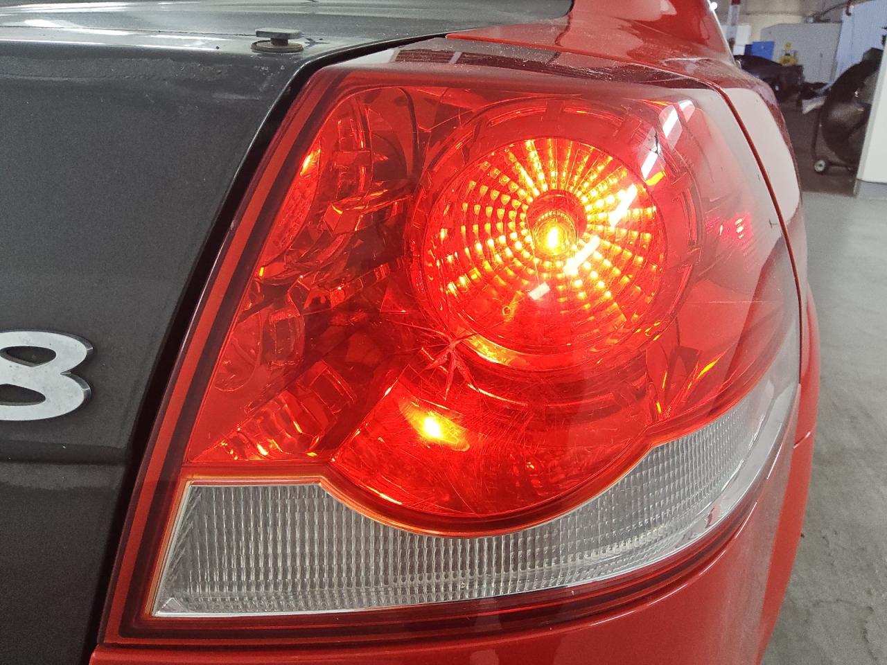 2009 Pontiac G8 Gt Red vin: 6G2EC57Y39L181295 Damage: Right Tail Light, Cracked, Replacement Required