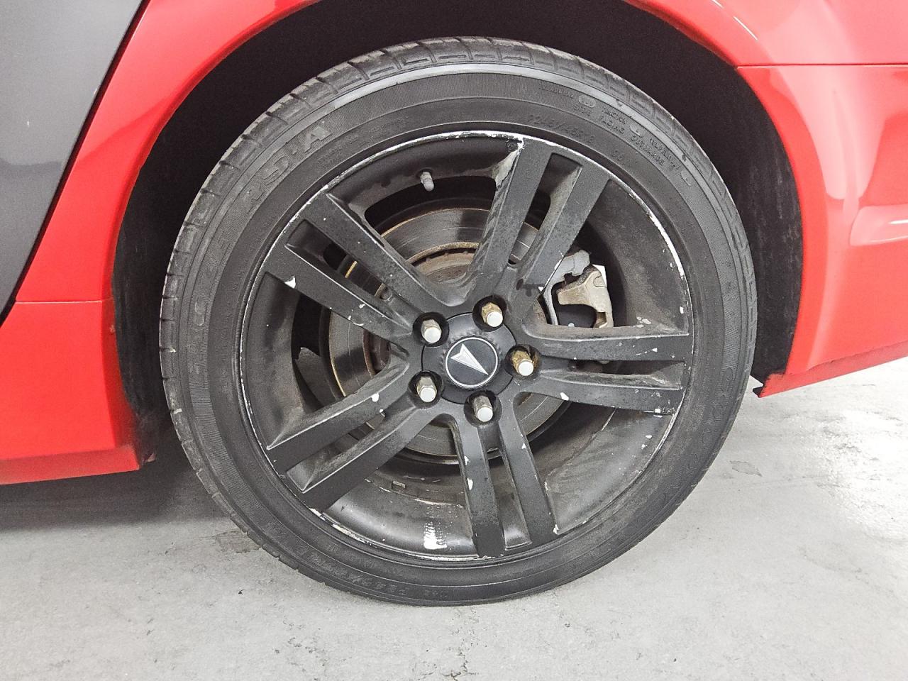 2009 Pontiac G8 Gt Red vin: 6G2EC57Y39L181295 Damage: Left Rear Wheel Cover, Curb Rash, > 12 Inches