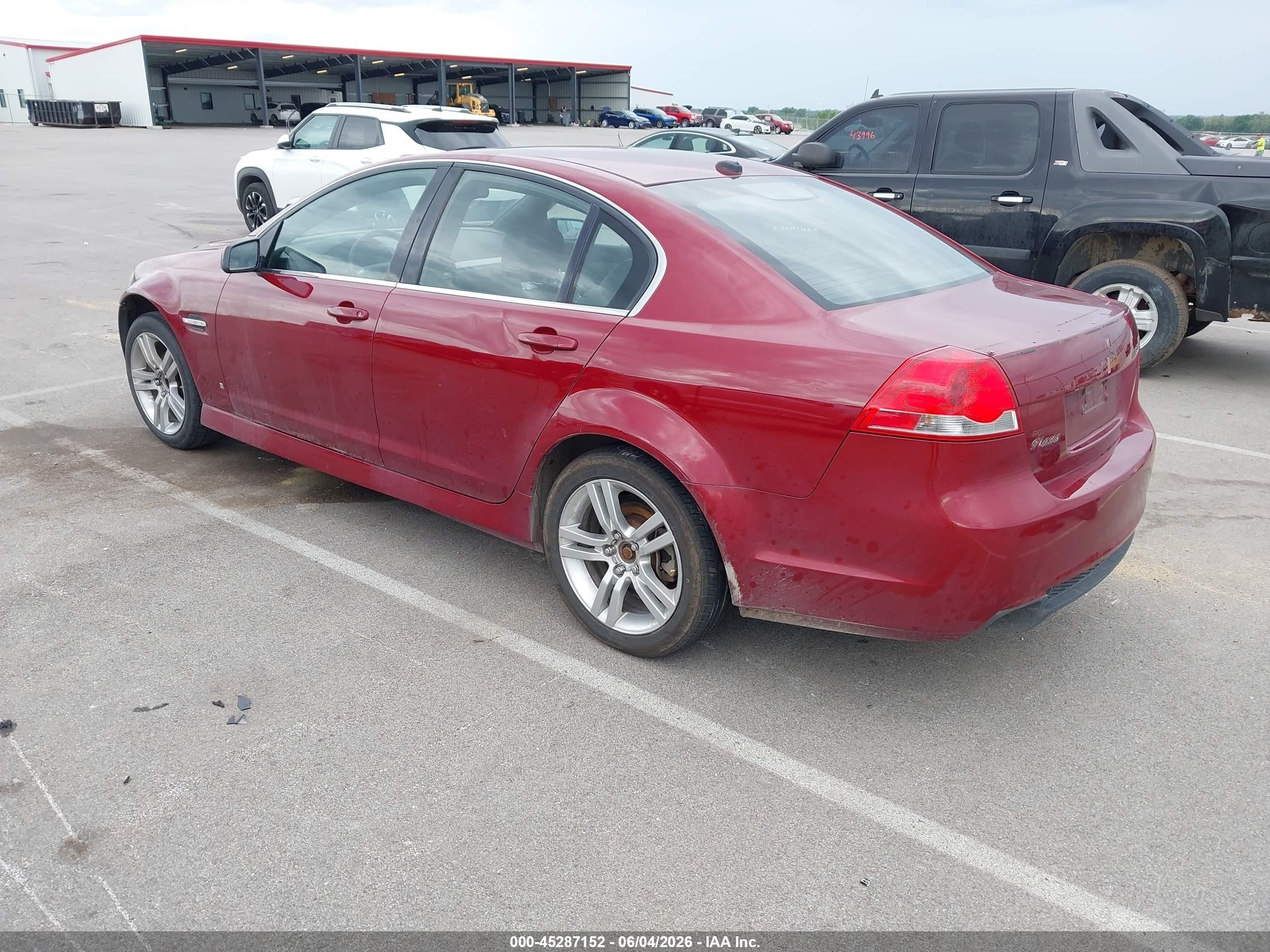 2009 Pontiac G8   Red vin: 6G2ER57749L233152