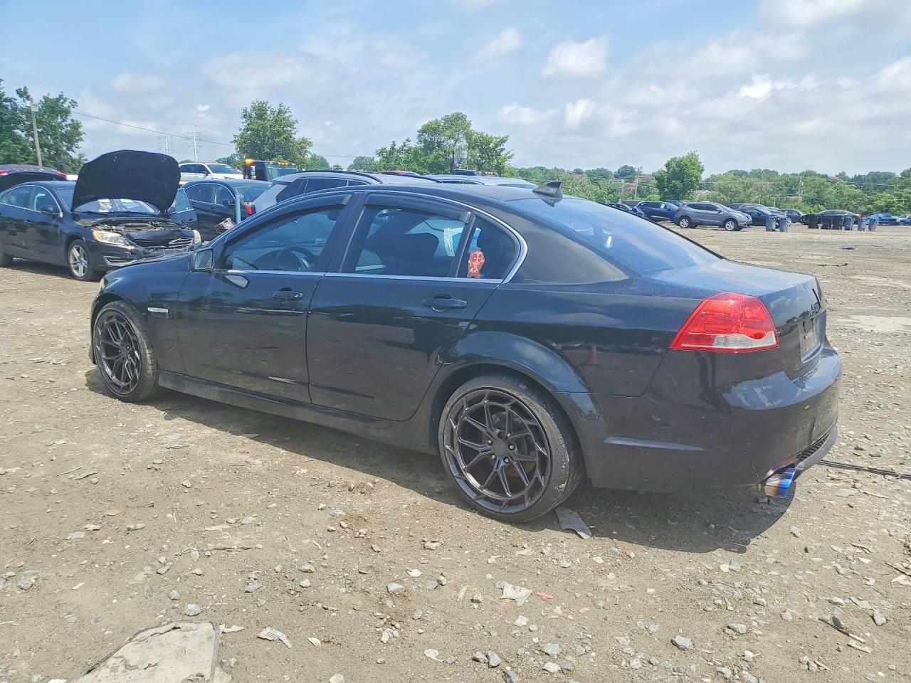 2009 Pontiac G8 Черный vin: 6G2ER57759L184768