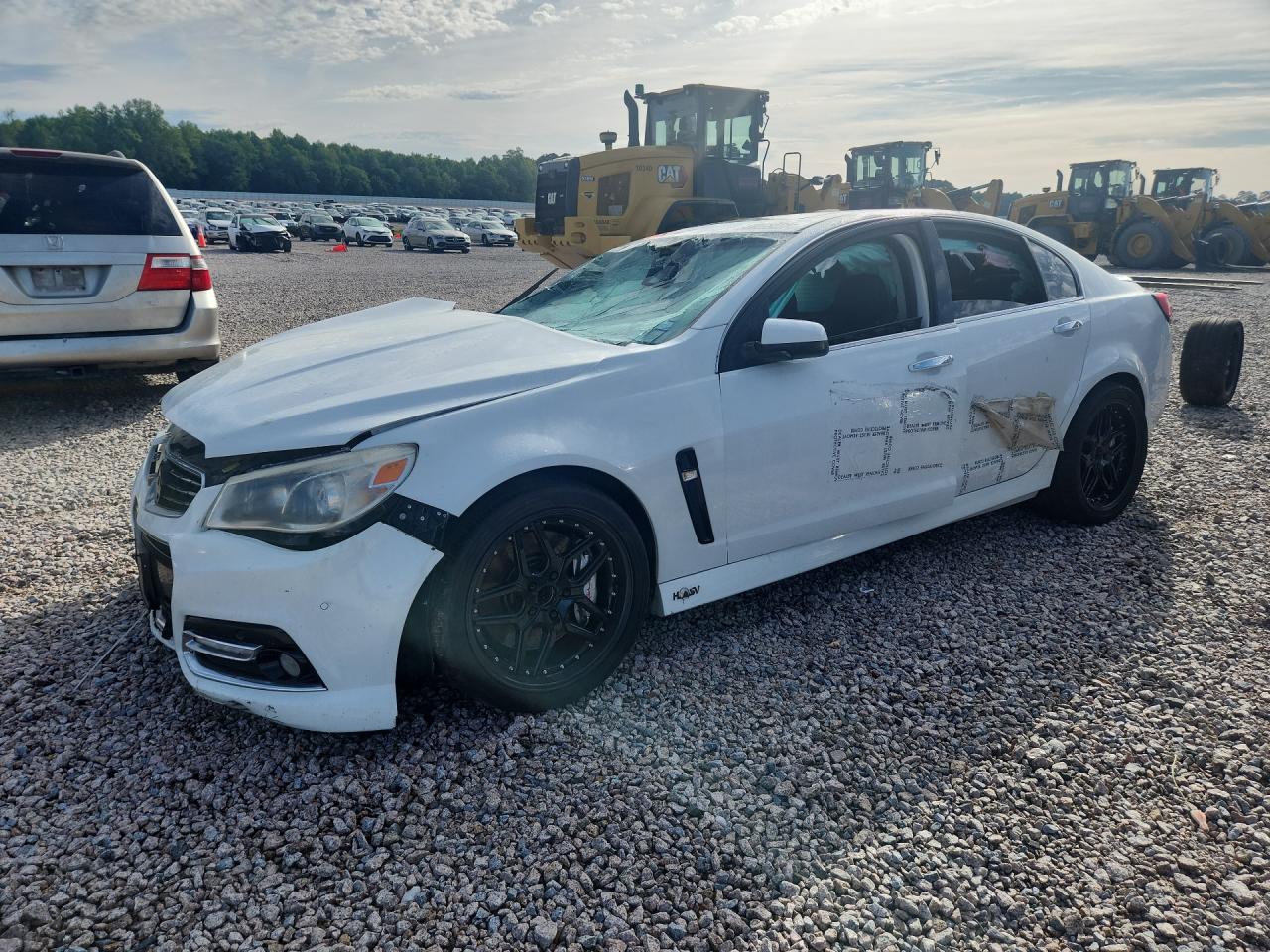2015 Chevrolet Ss White vin: 6G3F15RW0FL113761 Damage: Left Head Lamp, Misaligned, Repair Required