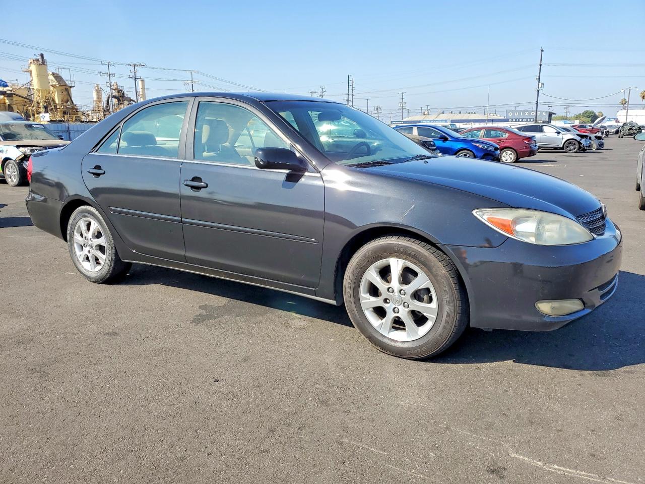 2004 Toyota Camry Le Black vin: JTDBE30K140279025