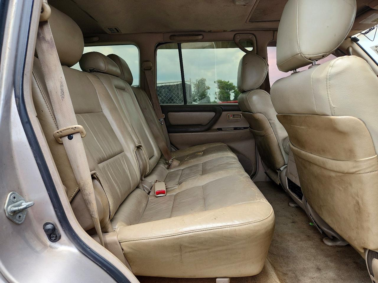 1999 Toyota Land Cruiser Base Gold vin: JT3HT05J5X0027141