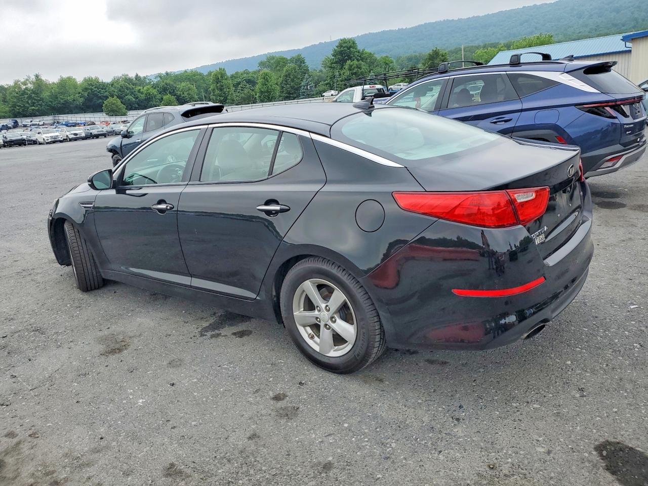 2015 Kia Optima Lx Черный vin: 5XXGM4A77FG482110