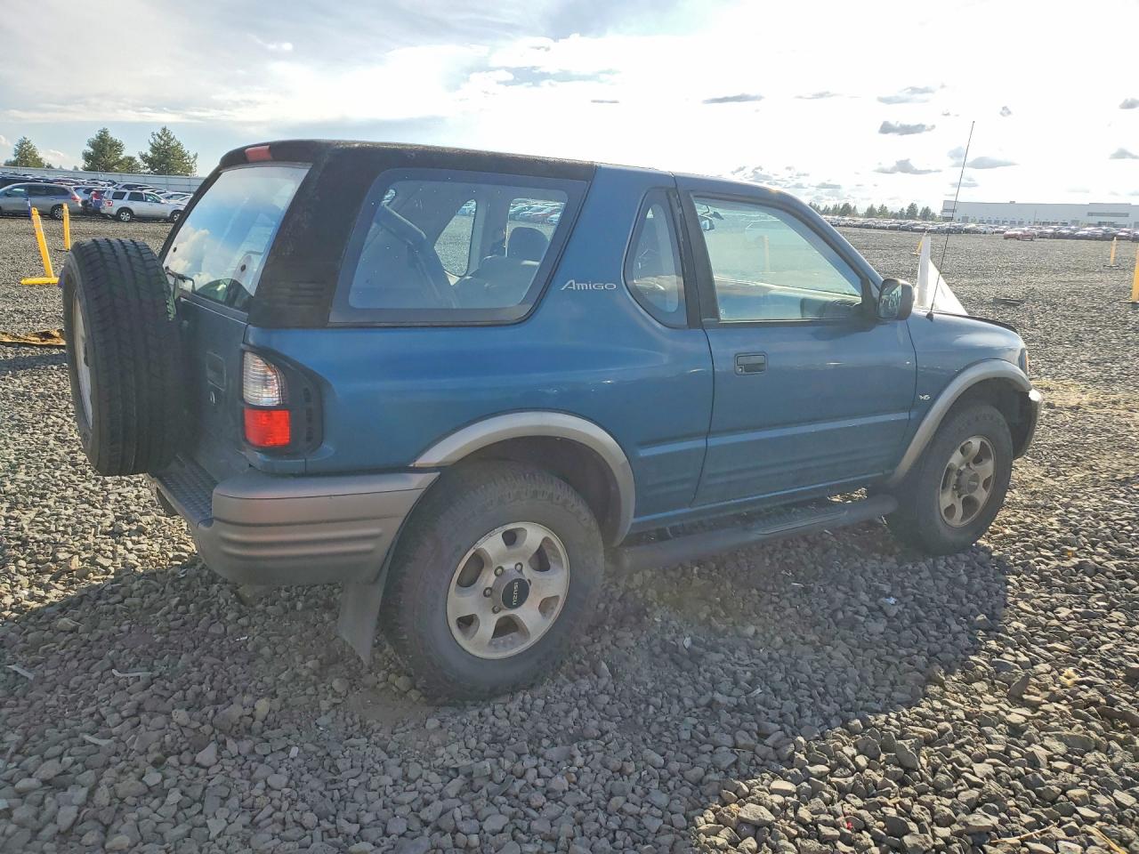 2000 Isuzu Amigo Blue vin: 4S2CK57W8Y4336499