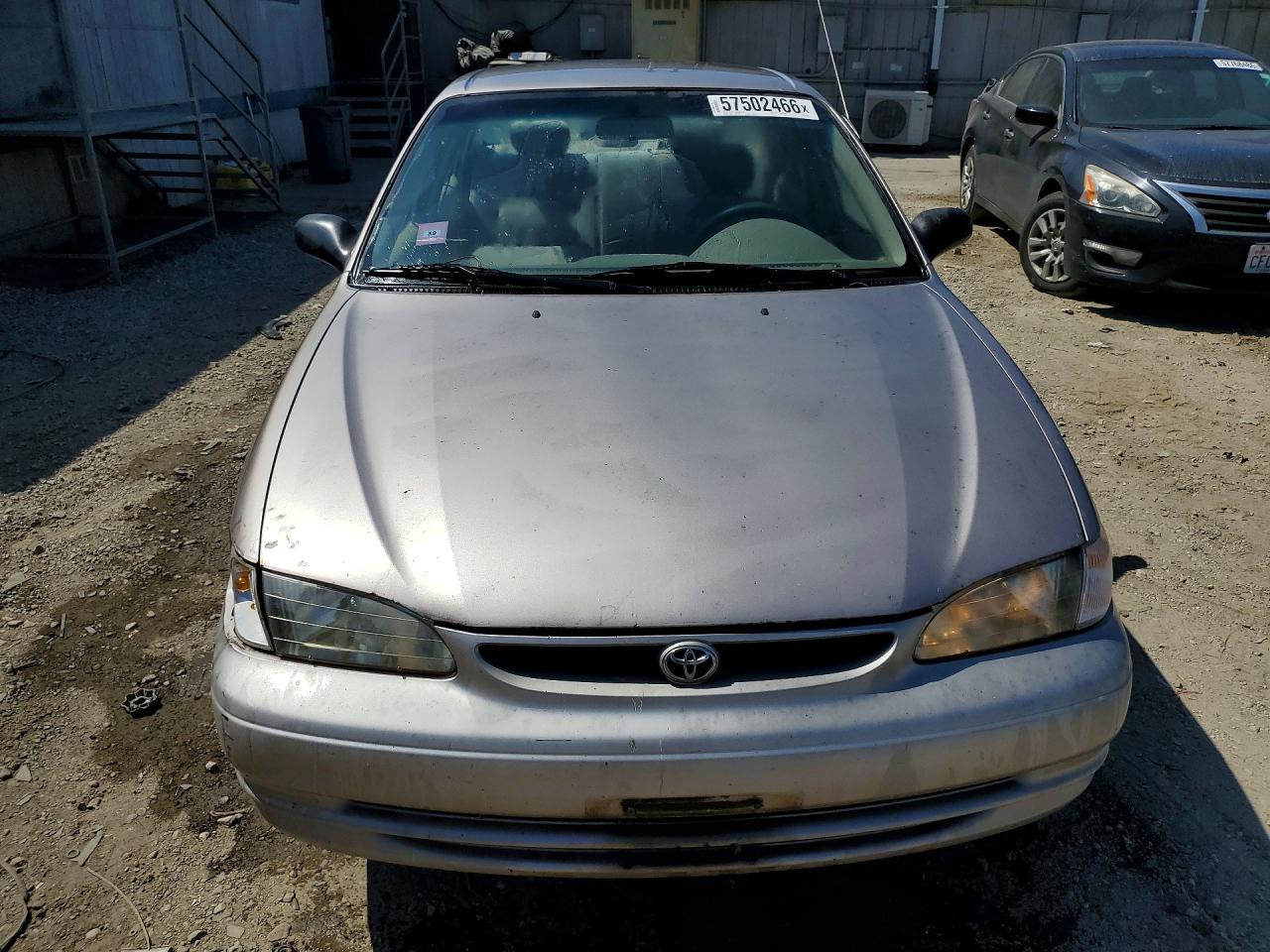 1998 Toyota Corolla Ve Tan vin: 1NXBR12EXWZ117823