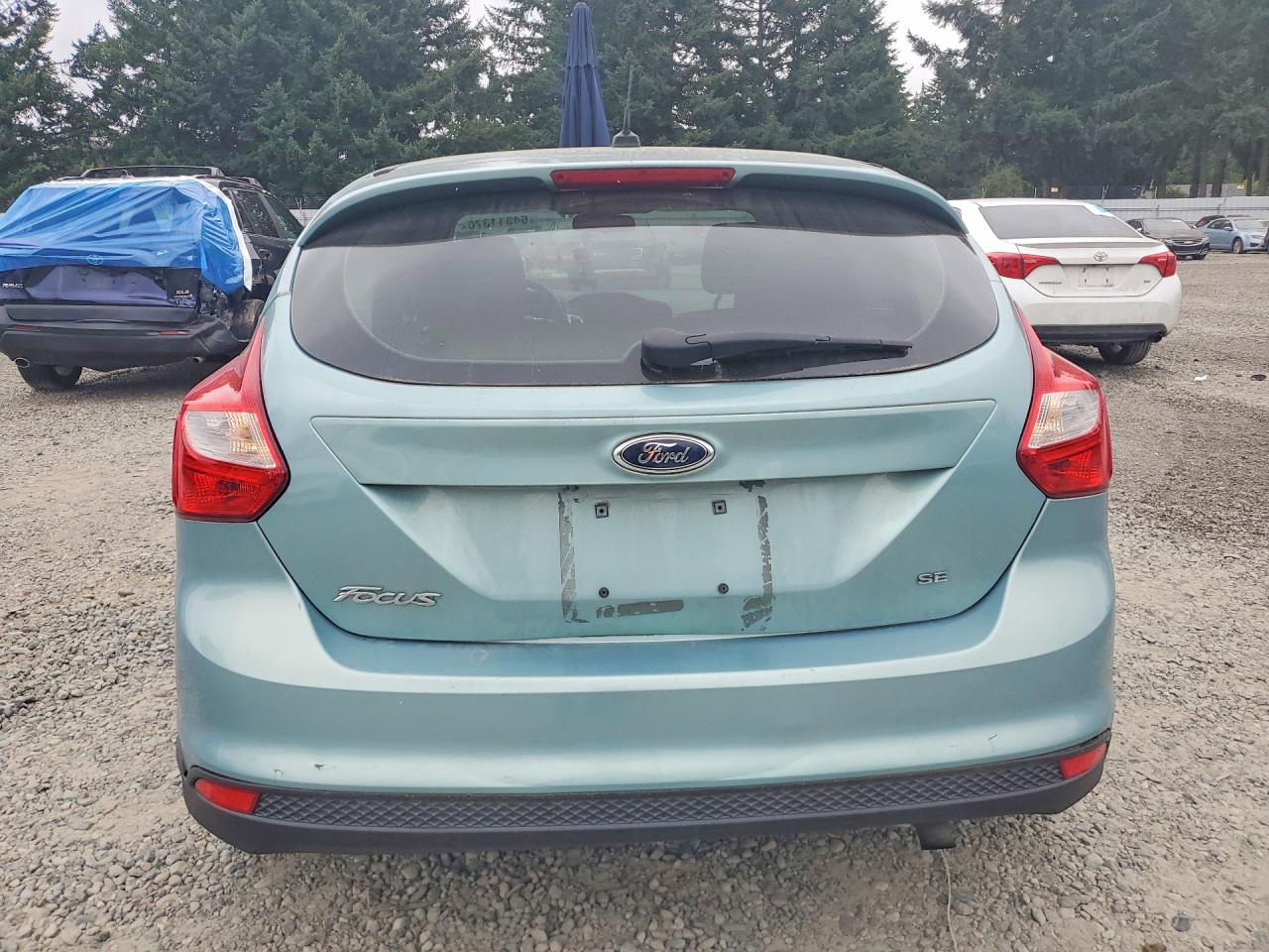 2012 Ford Focus Se Turquoise vin: 1FAHP3K24CL244533