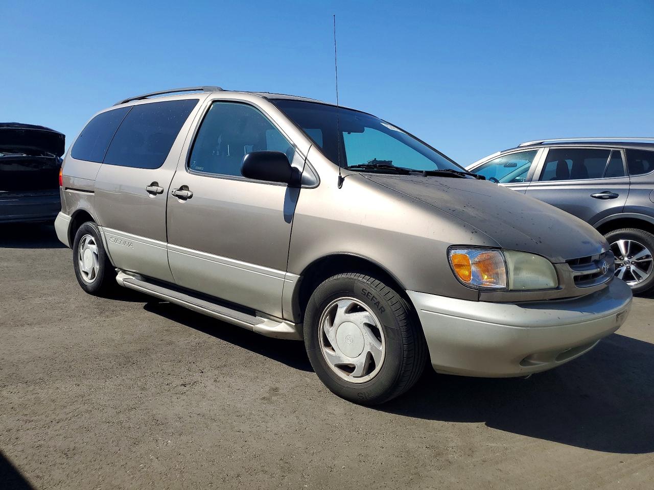 1999 Toyota Sienna Xle Tan vin: 4T3ZF13C9XU112285